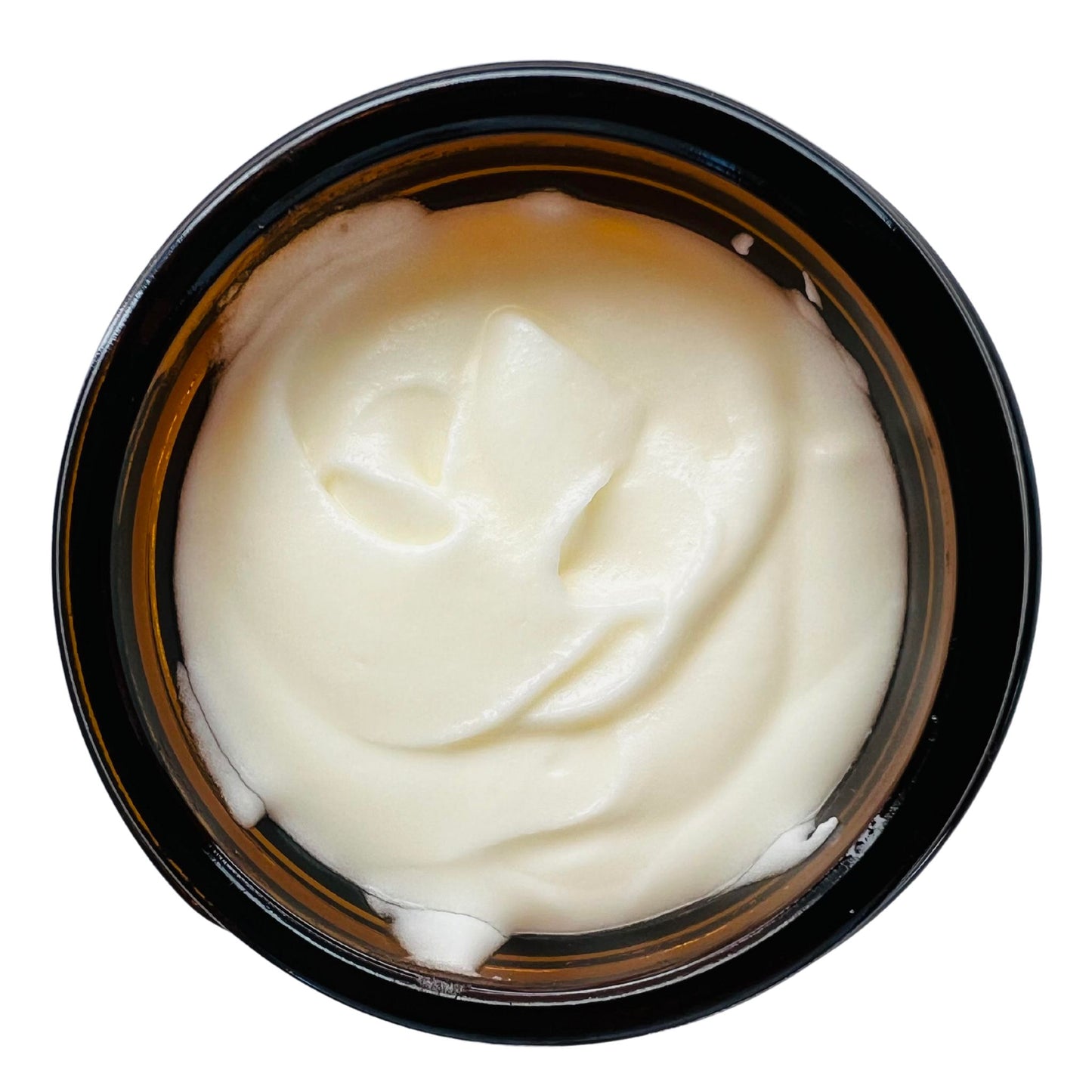 Open jar of tallow whip