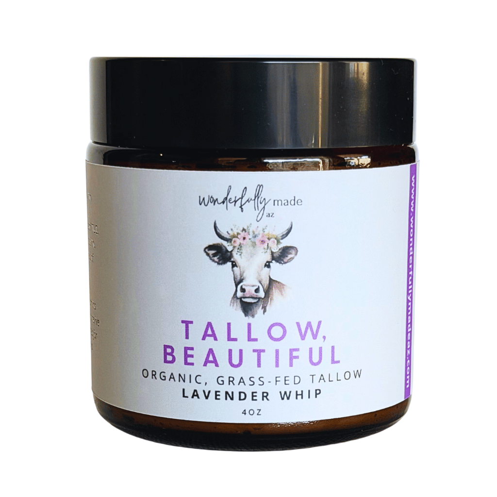 Jar of 'Tallow, Beautiful' organic tallow product with a cow illustration on a white background